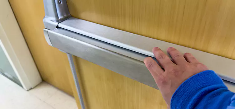 Installing a Push Bar on a Door University Place